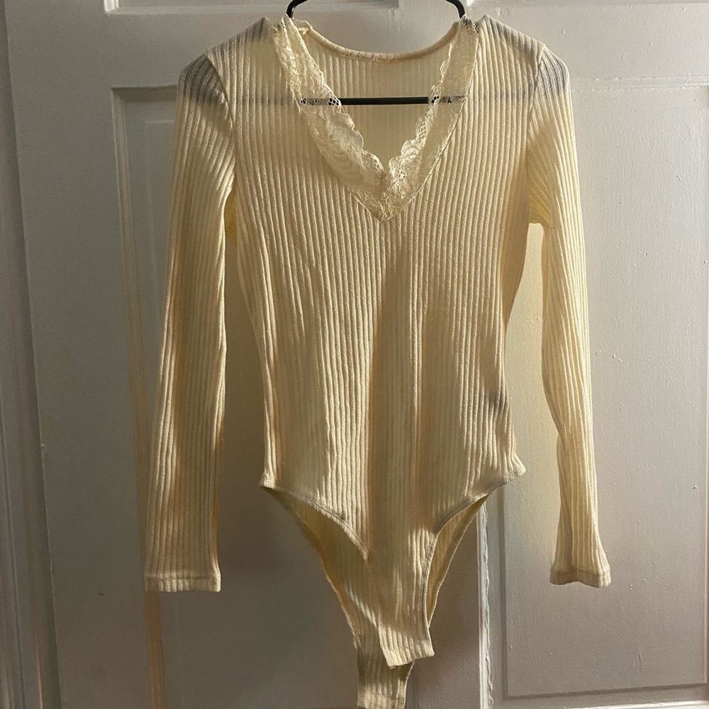 Cream ribbed bodysuit with lace collar